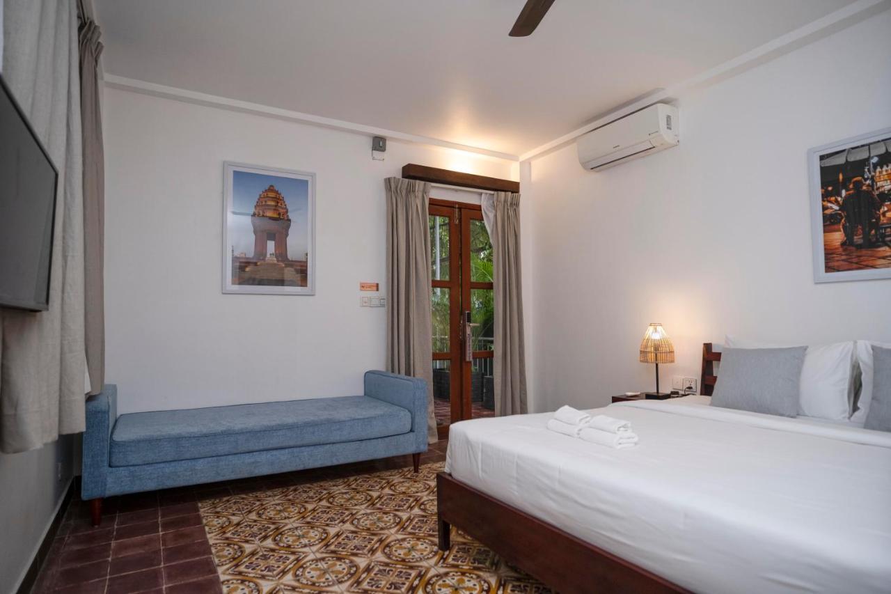 จังเกิล แอดดิชั่น Hotel พนมเปญ ภายนอก รูปภาพ